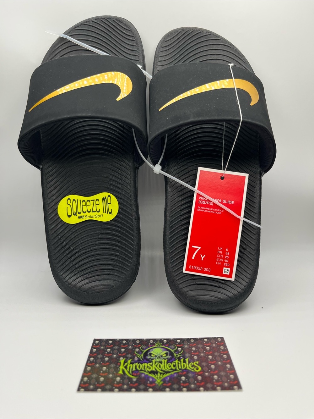 Nike Black Slide Sandals with Gold Swoosh - Kids